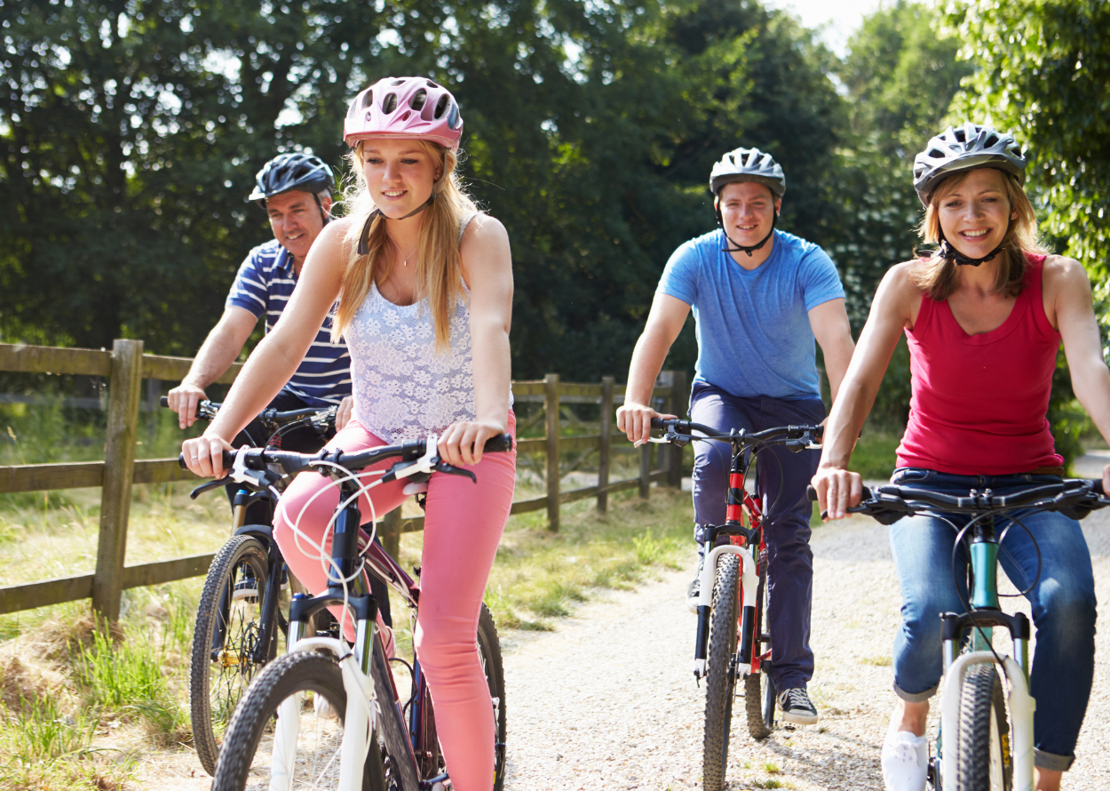 Family riding bikes being intentional parenting their teens and tweens